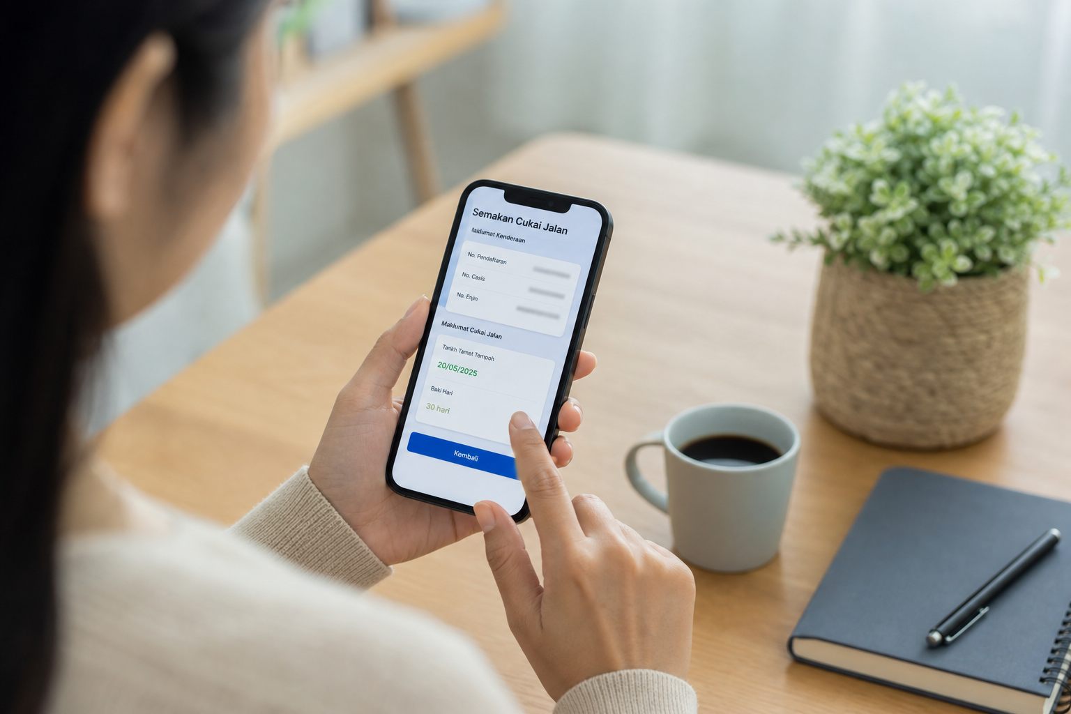 JPJ check road tax expiry - checking expiry date on a smartphone